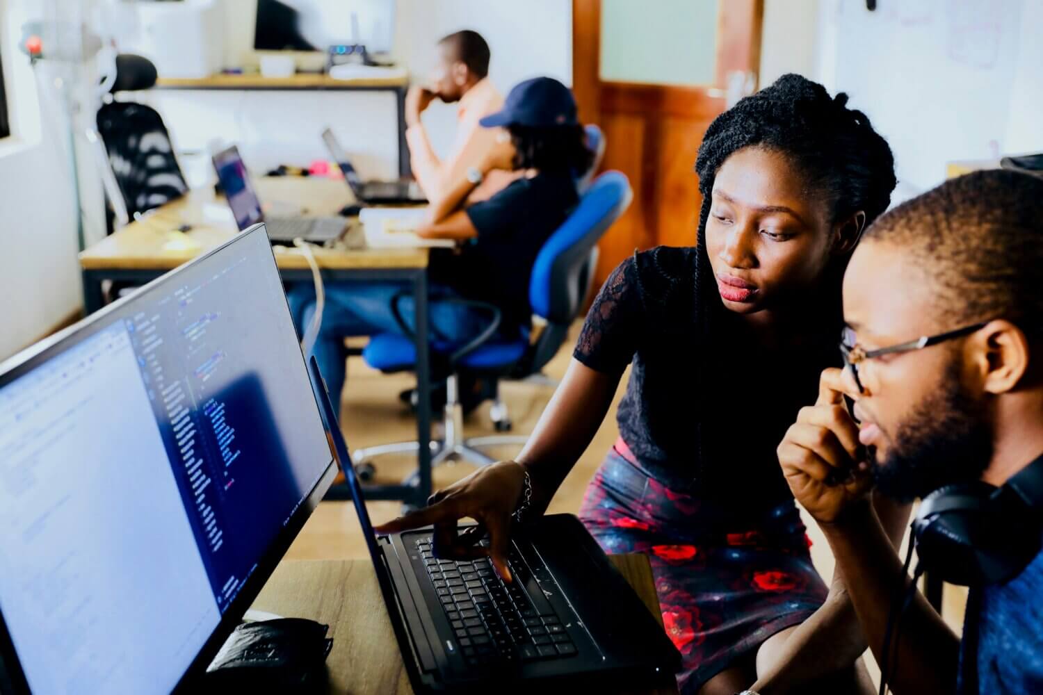 2 people looking at computer